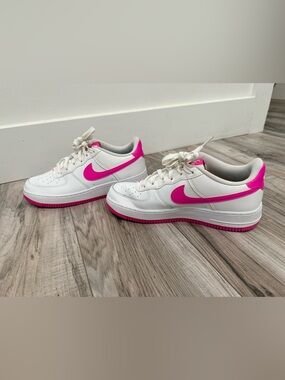 Nike White Sneakers with Bright Pink Swoosh and Soles